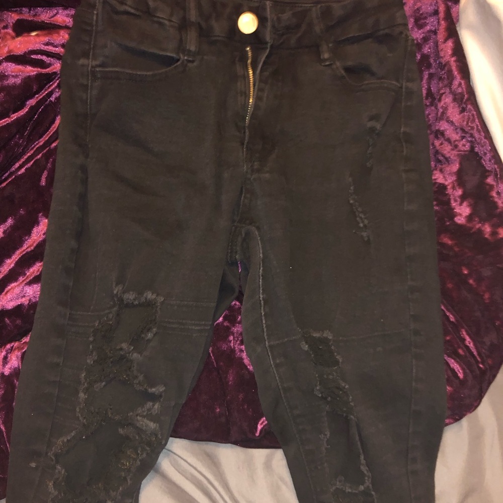 black ripped jeans